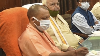 The Uttar Pradesh Law Commission on Monday submitted to chief minister Yogi Adityanath a controversial draft population control bill that proposes to bar people with more than two children from local body elections, government jobs, increments and promotions, and restrict their welfare benefits (PTI) The Uttar Pradesh Law Commission on Monday submitted to chief minister Yogi Adityanath a controversial draft population control bill that proposes to bar people with more than two children from local body elections, government jobs, increments and promotions, and restrict their welfare benefits (PTI)