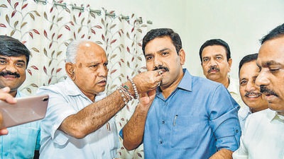 Vijayendra was accused of running a parallel administration under the aegis of Yediyurappa, the then CM, that led to simmering dissent within the BJP unit of the state, which openly called out the father-son duo for corruption. (PTI) Vijayendra was accused of running a parallel administration under the aegis of Yediyurappa, the then CM, that led to simmering dissent within the BJP unit of the state, which openly called out the father-son duo for corruption. (PTI)