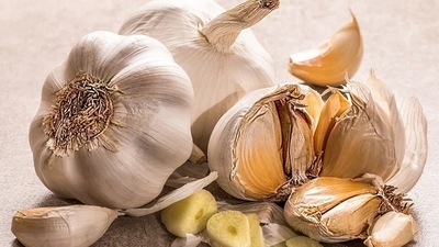 Garlic: Garlic is frequently used in Indian kitchen to cook curries, soups and other spicy preparations. It is loaded with health benefits and also helps in lowering blood pressure. Garlic purifies blood and keeps your cholesterol levels in check. Spices like ginger and cinnamon are equally beneficial. (Pixabay)