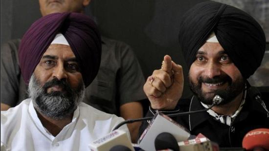 Jalandhar Cantt MLA Pargat Singh with Punjab Congress chief Navjot Singh Sidhu. Both had joined the Congress in 2016. (Ravi Kumar/HT file photo)