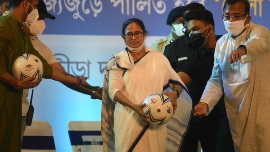 Chief Minister of West Bengal Mamata Banerjee seen with a football during an inaugural event of Khela Hobe Day to be observed on August 16.(Samir Jana/HT Photo)