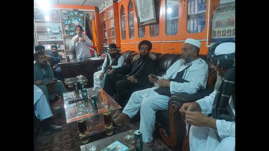 Taliban leaders with representatives of Sikh community at a gurdwara in Kabul on Monday.