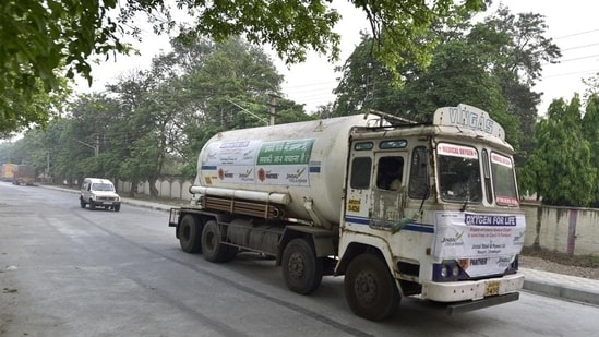 Oxygen tankers being escorted by Delhi Police as they move towards hospitals from Delhi Cant Railway Station amid the oxygen crisis.(PTI File Photo)