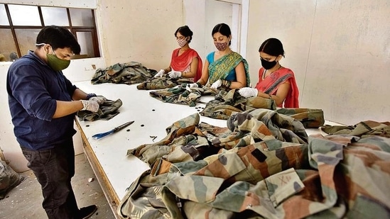 A unit in Khanpur in south Delhi, where military uniforms are repurposed into different products such as bags, masks, aprons, etc.&nbsp;(Sanjeev Verma/HT PHOTO)