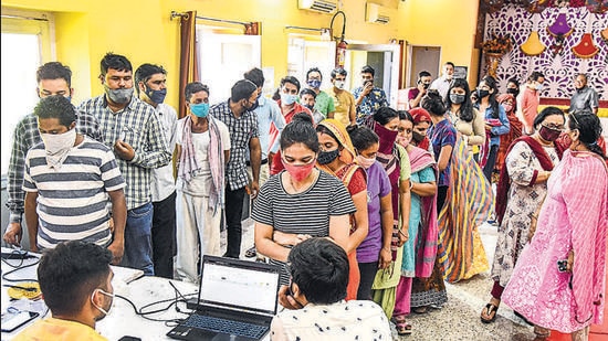 Beneficiaries wait to receive a dose of the Covid-19 vaccine at a special camp in Bikaner on August 12. (PTI)