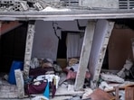 Beds are seen in a collapsed house after Saturday's 7.2 magnitude quake, in Les Cayes, Haiti.(Reuters Photo)
