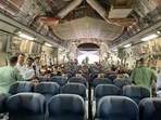 Indian diplomats and Indian journalists are seen inside the C17 Globemaster before it took off from the Kabul airport. Indian diplomats and Indian journalists are seen inside the C17 Globemaster before it took off from the Kabul airport.