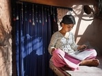 Khushi, a Class 9 student, attends her online class using the free Wi-Fi facility provided by the Delhi government at Mayapuri. (Sanchit Khanna/HT PHOTO) Khushi, a Class 9 student, attends her online class using the free Wi-Fi facility provided by the Delhi government at Mayapuri. (Sanchit Khanna/HT PHOTO)