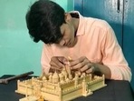 An 18-year-old boy has amazed people by building a miniature wooden replica of Puri's Jagannath Temple.(ANI) An 18-year-old boy has amazed people by building a miniature wooden replica of Puri's Jagannath Temple.(ANI)