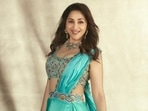 If looks could kill: Madhuri Dixit in pre-draped turquoise blue saree glams up Dance Deewane 3 stage(Instagram/@madhuridixitnene) If looks could kill: Madhuri Dixit in pre-draped turquoise blue saree glams up Dance Deewane 3 stage(Instagram/@madhuridixitnene)