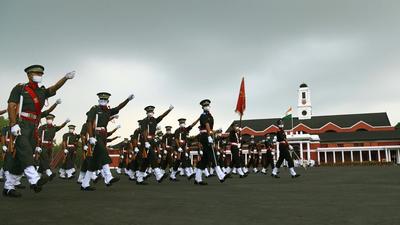 Newly-inducted officers march during the passing out parade at IMA in Dehradun on June 13, 2020. (File photo) Newly-inducted officers march during the passing out parade at IMA in Dehradun on June 13, 2020. (File photo)