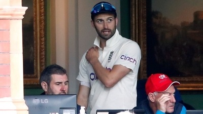 England's Mark Wood in the dressing room after leaving the field of play with an injury (Action Images via Reuters)