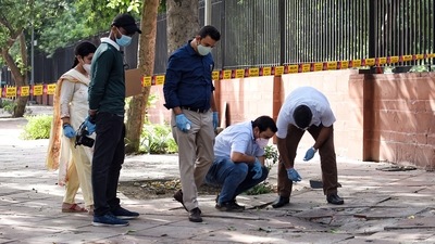 Delhi Police Crime Branch Team conducts an investigation at a site where a woman and a man allegedly set themselves on fire in front of Supreme Court gate number D, which has been cordoned off, in New Delhi (ANI Photo) Delhi Police Crime Branch Team conducts an investigation at a site where a woman and a man allegedly set themselves on fire in front of Supreme Court gate number D, which has been cordoned off, in New Delhi (ANI Photo)