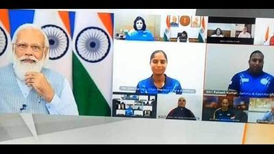 Prime Minister Narendra Modi interacting with Jyoti Baliyan and Rakesh Kumar, who have undergone training at Mata Vaishno Devi Sports Complex, on Tuesday. (Video grab sourced by HT)
