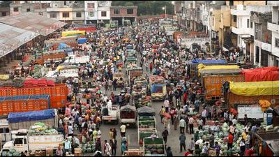 A crowded wholesale market on the outskirts of Jammu on Tuesday. (PTI)