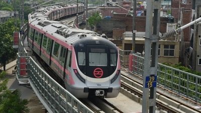 A metro train runs on a track after Delhi Metro's remaining portion of the Pink Line corridor was inaugurated, in New Delhi. (PTI Photo)