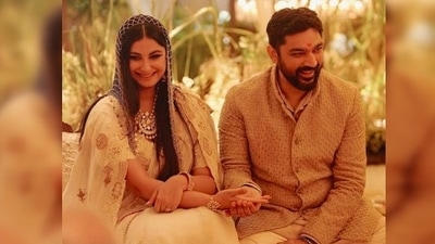 Rhea Kapoor's husband Karan Boolani looked dapper in an embroidered linen bandhgala, kurta, and ivory breech pants. (Instagram/@rheakapoor)