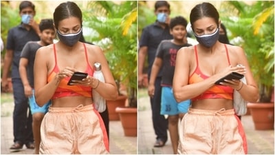 For Bollywood star Malaika Arora, fitness always comes first. She is an avid yoga practitioner, and often, she is spotted outside her yoga studio in Mumbai. Today, after a vigorous workout session, Malaika was clicked by the paparazzi. She nailed workout fashion goals in her ensemble, and we are taking notes. (Varinder Chawla) For Bollywood star Malaika Arora, fitness always comes first. She is an avid yoga practitioner, and often, she is spotted outside her yoga studio in Mumbai. Today, after a vigorous workout session, Malaika was clicked by the paparazzi. She nailed workout fashion goals in her ensemble, and we are taking notes. (Varinder Chawla)