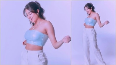 Janhvi Kapoor rocked in a metallic tube crop top which she teamed with high waisted, flared pants and heels. (Instagram/@janhvikapoor)