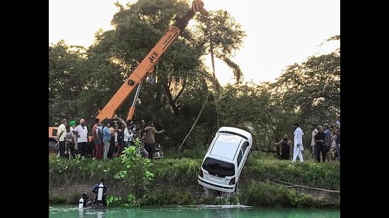The car being pulled out of the Bhakra canal near Ablowal village in Patiala district on Tuesday.