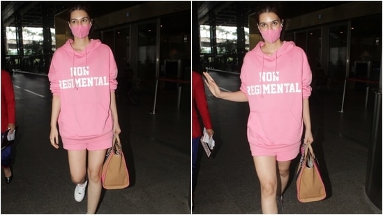 Kriti, on the other hand, opted for a monotone look for her arrival in Mumbai. She wore a blush pink oversized sweatshirt and shorts for the airport look. The droopy sleeves and loose silhouette of the hoodie added a laidback vibe to her outfit.(Varinder Chawla)