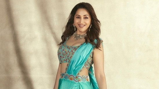 If looks could kill: Madhuri Dixit in pre-draped turquoise blue saree glams up Dance Deewane 3 stage(Instagram/@madhuridixitnene)