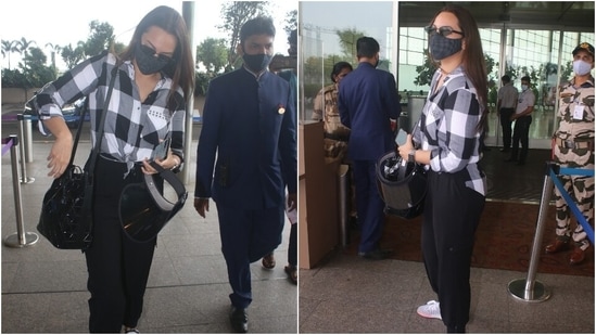 Sonakshi carried a black shoulder bag with her attire. She completed the look with a black face mask, vintage sunglasses, lace-up shoes, a watch and middle-parted open tresses. (Varinder Chawla)