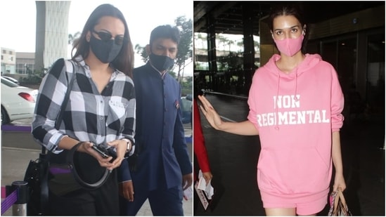 Bollywood actors Sonakshi Sinha and Kriti Sanon were snapped at the Mumbai airport today. For their airport looks, both the stars chose comfort over fashion and rocked uber-cool ensembles. While Sonakshi opted for darker hues for her flight out of Mumbai, Kriti chose a bright monotone outfit for her arrival in the bay.(Varinder Chawla)