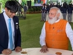 In the video, PM Modi can be seen talking to Tokyo Olympics gold medallist Neeraj Chopra, archer Deepika Kumari, silver medallist wrestler Ravi Dahiya and fencer Bhawani Devi among others.