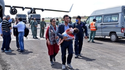 Indian civilians who were evacuated are pictured after their flight landed in the western Indian city of Jamnagar for refueling on the way to Delhi. (REUTERS) Indian civilians who were evacuated are pictured after their flight landed in the western Indian city of Jamnagar for refueling on the way to Delhi. (REUTERS)