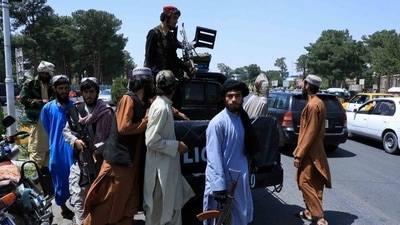 Taliban forces patrol a street in Herat, Afghanistan. (Reuters Photo)