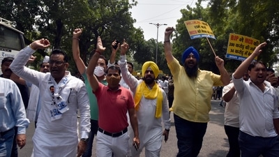 New Delhi, India - Aug. 18, 2021: Aam Aadmi Party (AAP) workers protest against BJP and MCD over the selling of Novelty Cinema, near BJP office, in New Delhi, India, on Wednesday, August 18, 2021. (Photo by Sanjeev Verma/ Hindustan Times) (Sanjeev Verma/HT PHOTO) New Delhi, India - Aug. 18, 2021: Aam Aadmi Party (AAP) workers protest against BJP and MCD over the selling of Novelty Cinema, near BJP office, in New Delhi, India, on Wednesday, August 18, 2021. (Photo by Sanjeev Verma/ Hindustan Times) (Sanjeev Verma/HT PHOTO)