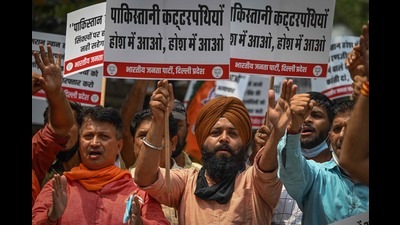 Activists of Bharatiya Janata Party (BJP) raise slogans against a Pakistani hardliner group in New Delhi on Wednesday. (AFP)