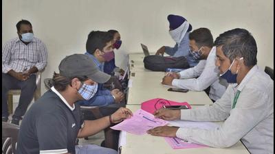 Candidates during the job fair organised by district bureau of employment & enterprises in Ludhiana on Wednesday. (Gurpreet Singh/HT) Candidates during the job fair organised by district bureau of employment & enterprises in Ludhiana on Wednesday. (Gurpreet Singh/HT)