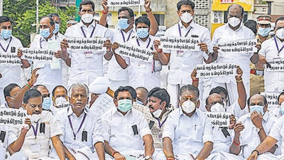 Edapaddi K. Palaniswami, leader of opposition in the Tamil Nadu Legislative Assembly along with deputy floor leader & AIADMK co-coordinator O Pannerselvam, and AIADMK MLAs, protests after staging a walkout from the Assembly during the "Discussion on State budget", at Kalaivanar Arangam in Chennai on Wednesday. (PTI) Edapaddi K. Palaniswami, leader of opposition in the Tamil Nadu Legislative Assembly along with deputy floor leader & AIADMK co-coordinator O Pannerselvam, and AIADMK MLAs, protests after staging a walkout from the Assembly during the "Discussion on State budget", at Kalaivanar Arangam in Chennai on Wednesday. (PTI)