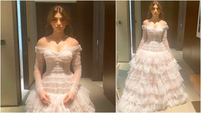Urvashi Rautela goes all Victorian in this white off-shoulder ruffled gown. With wavy hair and minimal makeup, Urvashi looked beautiful as always. (Instagram/@urvashirautela)