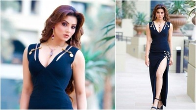 Urvashi Rautela aced the thigh-high slit gown look as she posed in a black, deep neck ensemble. (Instagram/@urvashirautela)