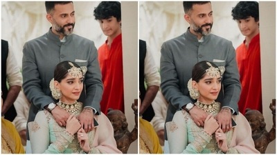 Sonam Kapoor with husband Anand Ahuja at Rhea Kapoor's wedding. Sonam Kapoor with husband Anand Ahuja at Rhea Kapoor's wedding.