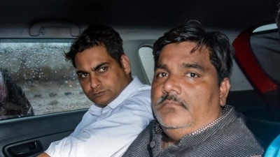 Suspended AAP councillor Tahir Hussain (right) is accused of being involved in the Delhi riots that took place in February. (File Photo / PTI) Suspended AAP councillor Tahir Hussain (right) is accused of being involved in the Delhi riots that took place in February. (File Photo / PTI)
