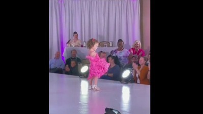 The image shows the little girl walking on the runway. (Instagram/@kristenweaverstudio) The image shows the little girl walking on the runway. (Instagram/@kristenweaverstudio)