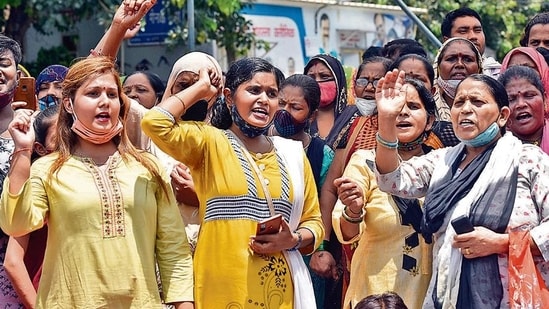 Women hold a protest on August 4. The minor girl was allegedly raped and murdered by the four suspects on August 1. (Sanjeev Verma/HT)