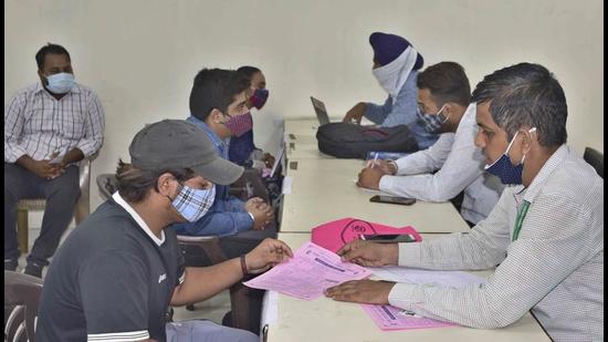 Candidates during the job fair organised by district bureau of employment & enterprises in Ludhiana on Wednesday. (Gurpreet Singh/HT)