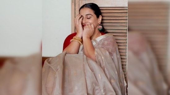 With bold red lips and hair tied in a neat ponytail, Vidya Balan once again grabbed eyeballs with her ethnic look.(Instagram/@vidyabalan)