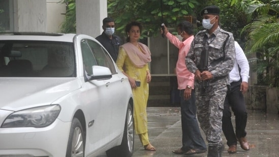 Kangana wore a yellow full-sleeved kurta, which was embroidered in floral patterns and featured a round neckline. The loose silhouette of the long kurta makes it a perfect fit for rainy days or summery afternoons. (HT Photo/Varinder Chawla)