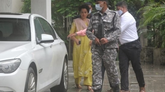 Bollywood actor Kangana Ranaut, for her outing in Mumbai today, chose to go the traditional route. Looking simply chic, the star wore a bespoke yellow suit which she paired with a contrasting dupatta.(HT Photo/Varinder Chawla)