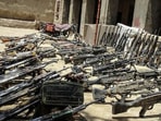 Taliban showcasing seized weapons from fleeing Afghan and allied forces.