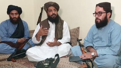 Waheedullah Hashimi (Centre) spoke with Reuters about the Taliban's governance plan during an interview at an undisclosed location near the Afghanistan-Pakistan border. (REUTERS)
