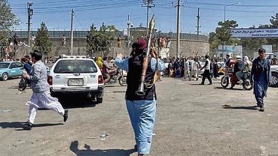 A member of the Taliban outside the Kabul airport. (REUTERS) A member of the Taliban outside the Kabul airport. (REUTERS)