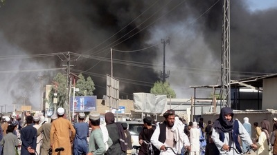 Smoke rises after fighting between the Taliban and Afghan security personnel in the city of Kandahar, southwest of Kabul, Afghanistan. (AP) Smoke rises after fighting between the Taliban and Afghan security personnel in the city of Kandahar, southwest of Kabul, Afghanistan. (AP)