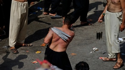 A Shiite Muslim flagellates himself with blades on chains during a procession to mark Ashoura, in Rawalpindi, Pakistan. (AP / Representational Image) A Shiite Muslim flagellates himself with blades on chains during a procession to mark Ashoura, in Rawalpindi, Pakistan. (AP / Representational Image)